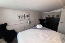 Two double bedrooms in the Stags Head Apartment at Richmond Park Hotel, ideal for families or groups.