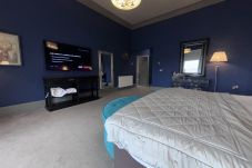 Interior view of the Full Suite at Richmond Park Hotel, highlighting its elegant design and furnishings.